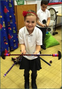 Flower Stick Juggler in a School Circus skills workshop with Circus Sensible